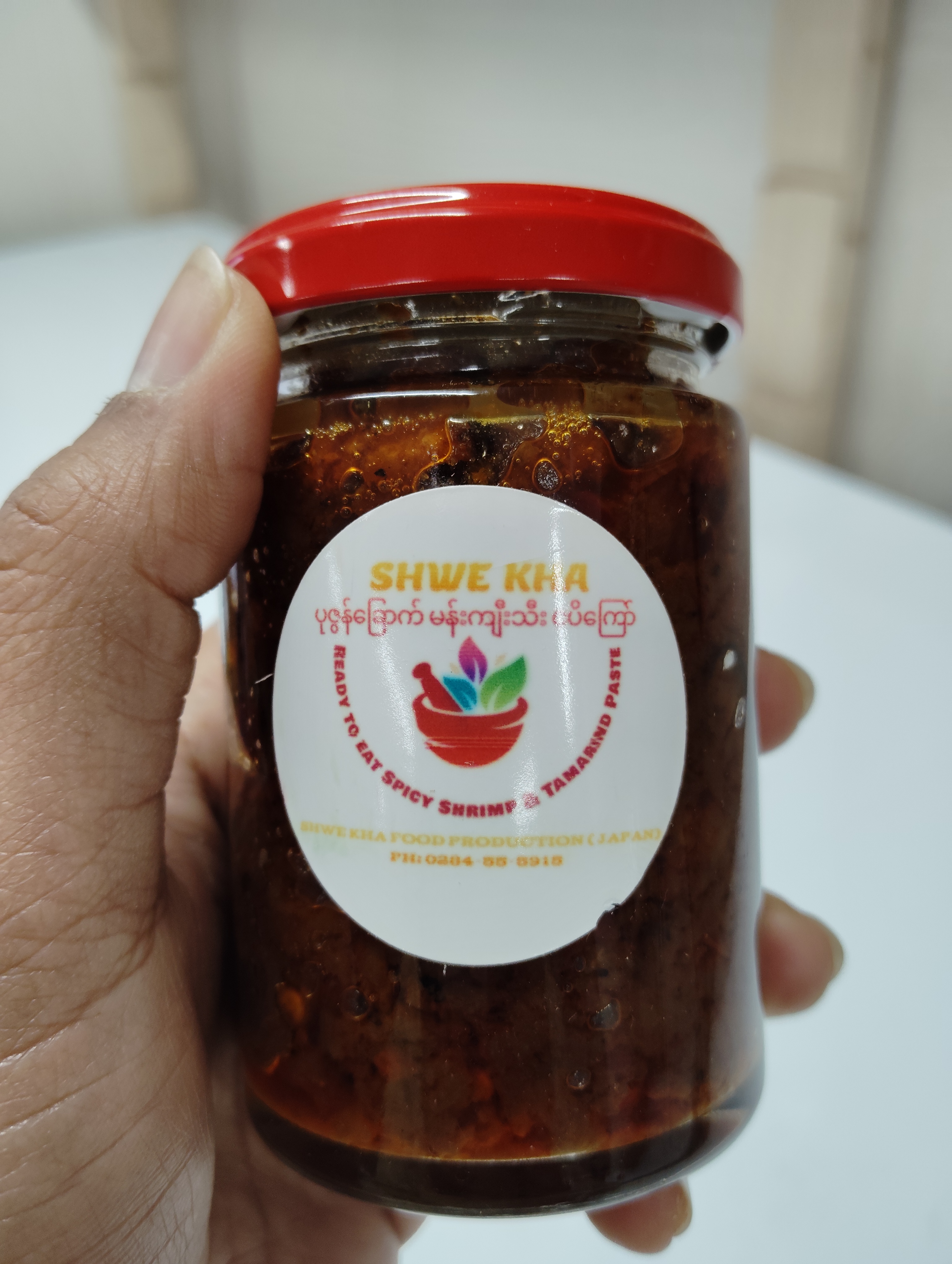 ပုဇွန်ခြောက်မန်းကျီးသီးငပိကြော် shwe kha